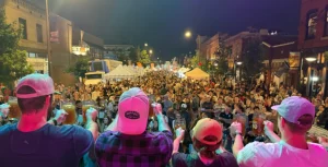 Guests enjoying traditional music, food, and drinks at The Denver Oktoberfest